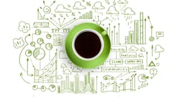 Conceptual-image-of-cup-of-coffee-with-business-sketches-at-background