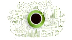 Conceptual-image-of-cup-of-coffee-with-business-sketches-at-background