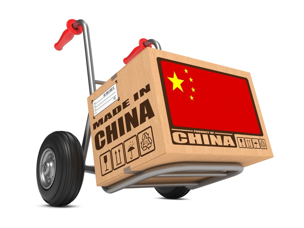 1661880589564 Cardboardboxwithflagofchinaandmadeinchinasloganonhandtruckwhitebackground