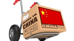 Cardboard Box With Flag Of China And Made In China Slogan On Hand Truck White Background Free Shipping Concept