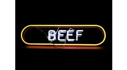Neon-sign-in-window-of-restaurant-isolated-on-black