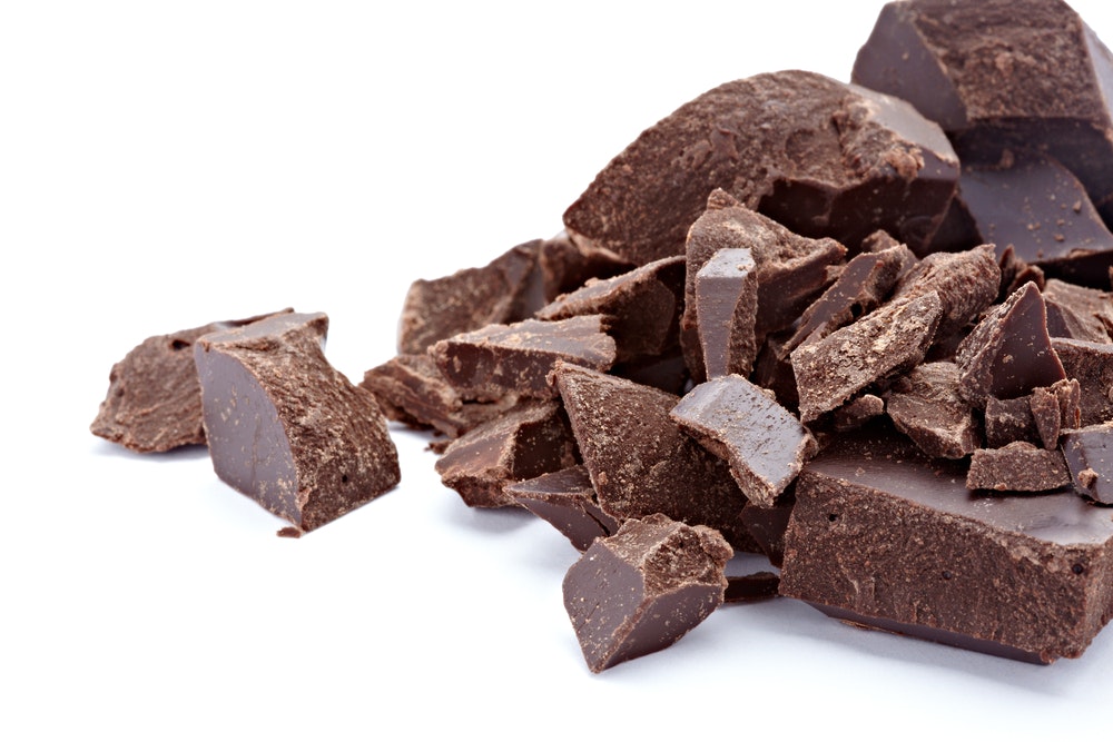 1661880804740 Closeupofchocolatepiecesonwhitebackground1