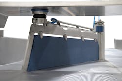 Key Technology&apos;s auto-diverter for its Iso-Flo vibratory conveyor line is well-suited for bulk product and packaging distribution lines.