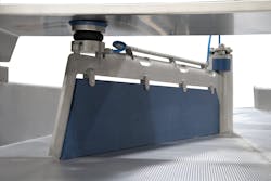Key Technology's auto-diverter for its Iso-Flo vibratory conveyor line is well-suited for bulk product and packaging distribution lines. Key Technology's auto-diverter for its Iso-Flo vibratory conveyor line is well-suited for bulk product and packaging distribution lines.