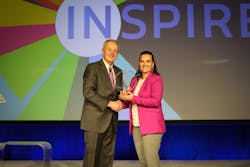 Staci Richardson, vice president of enterprise quality and food safety at Schreiber Foods accepts the award on behalf of her team. Staci Richardson, vice president of enterprise quality and food safety at Schreiber Foods accepts the award on behalf of her team.
