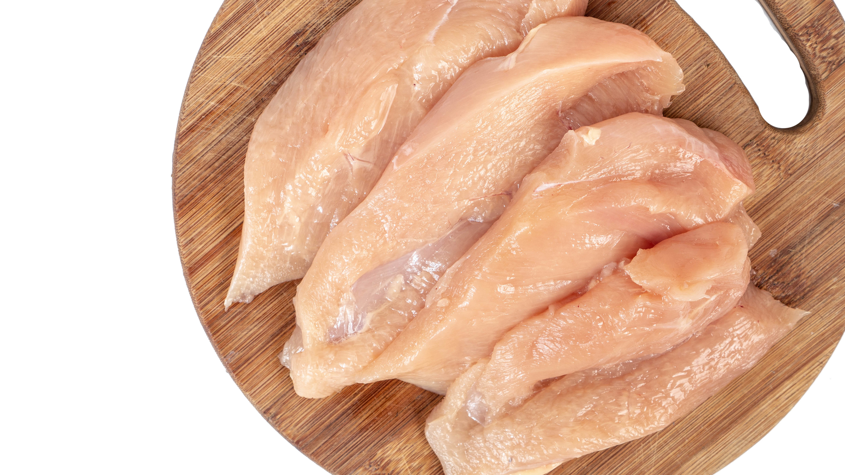 'Raw Chicken Breasts on the wooden board with copy space'