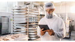 Man On Tablet In Factory 1540x800
