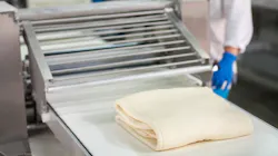 dough sheet on conveyor
