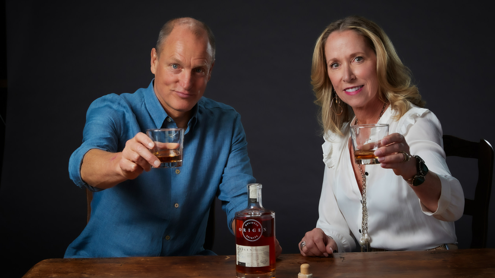 Woody Harrelson and Amy Holmwood have co-founded Holistic Spirits Co., launching two new all-natural, botanical ingredients-based products.