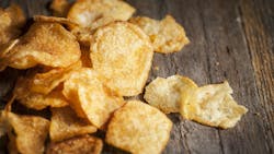 kettle chips on wood table kettle chips on wood table