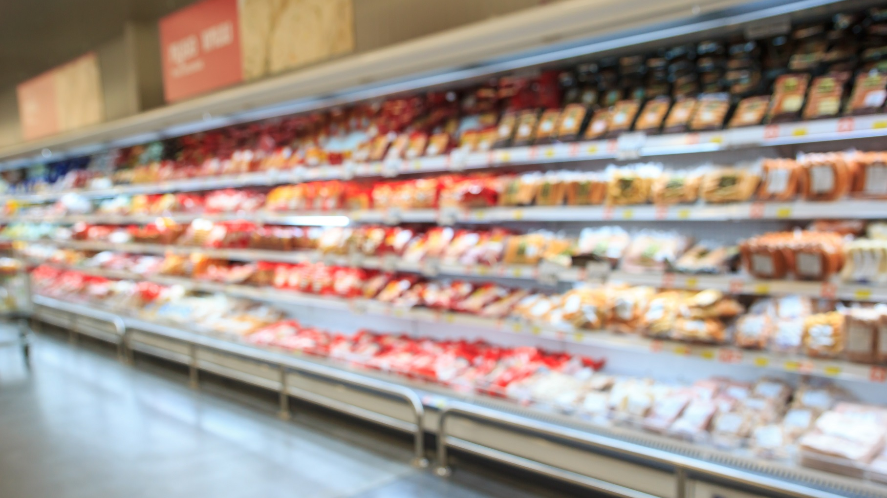 supermarket meat aisle department blurred