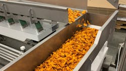 Jacksons sweet potato chips on vibratory conveyor Jacksons sweet potato chips on vibratory conveyor