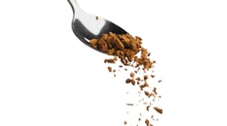 coffee grounds poured off spoon