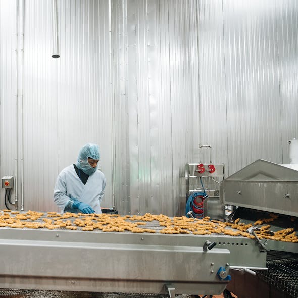 Chicken nugget production in Tyson Foods&apos; new Danville, Va., fully cooked processing plant.