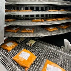 Spiral conveyors at Cafe Spice&apos;s new Beacon, N.Y., processing plant offer higher quality stabilization and chilling for the company&apos;s meal products.