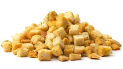 Pile of homemade bread croutons isolated on white background Pile of homemade bread croutons isolated on white background
