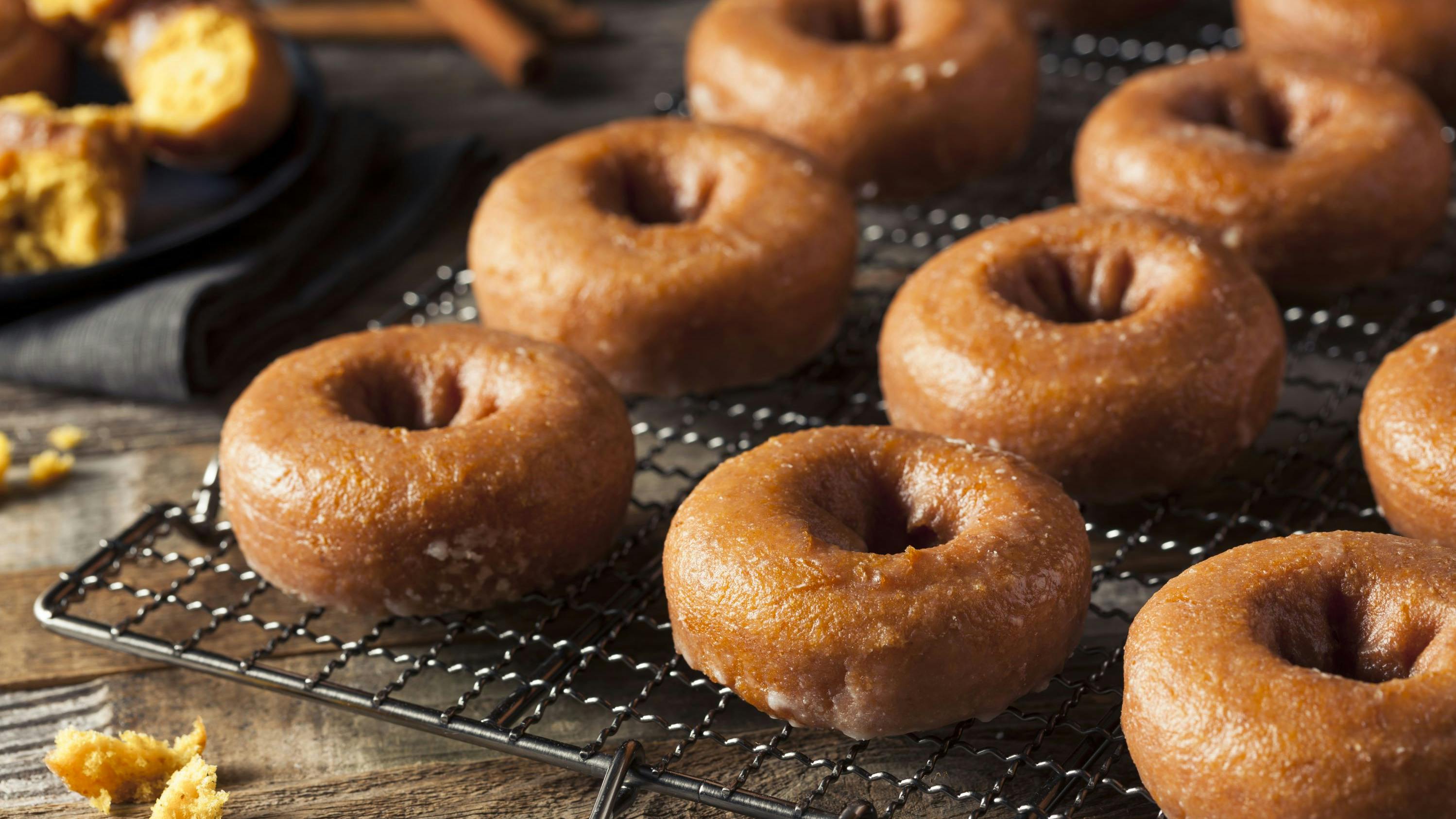 Homemade Glazed Autumn Pumpkin Donuts Ready to Eat