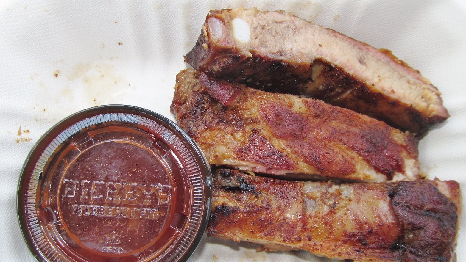 dickeys_barbecue_pit_bbq_ribs_and_sauce_2699292206