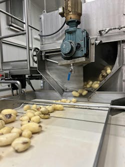 The Keystone facility sources its energy from a nearby landfill’s methane, which is piped to the plant and used to create the steam needed for this steam peeler, for example. The Keystone facility sources its energy from a nearby landfill’s methane, which is piped to the plant and used to create the steam needed for this steam peeler, for example.