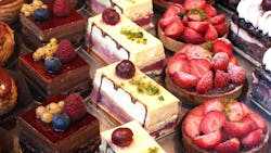 Colorful display of pastries topped with fruits (shallow depth of field) Colorful display of pastries topped with fruits (shallow depth of field)