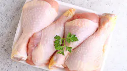 raw chicken legs in white packaging raw chicken legs in white packaging