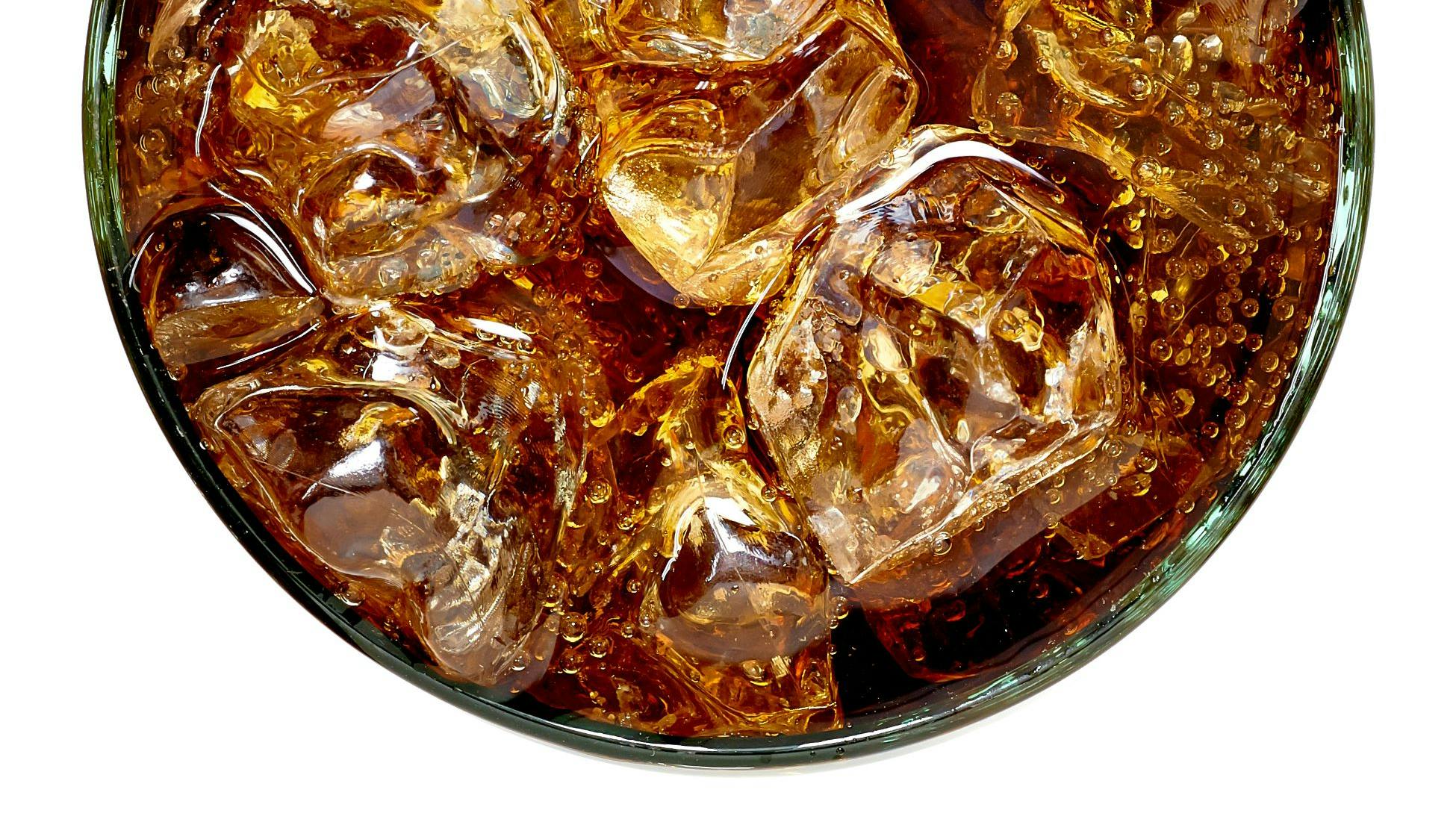 Cola In Glass With Ice Isolated On White Background From Top View