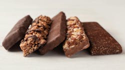 Tasty protein bars on white table. Healthy snack Tasty protein bars on white table. Healthy snack