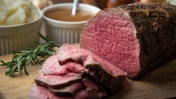sliced eye of round beef roasted beef on cutting board sliced eye of round beef roasted beef on cutting board