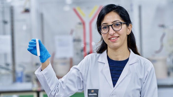 Dr. Bhavna Tandon, chief scientific officer at Brown Foods, unveils a test-tube full of UnReal Milk &mdash; the world&rsquo;s first lab-made whole cow milk, at Brown Foods&rsquo; lab in Boston.