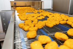 chicken nuggets on production line chicken nuggets on production line