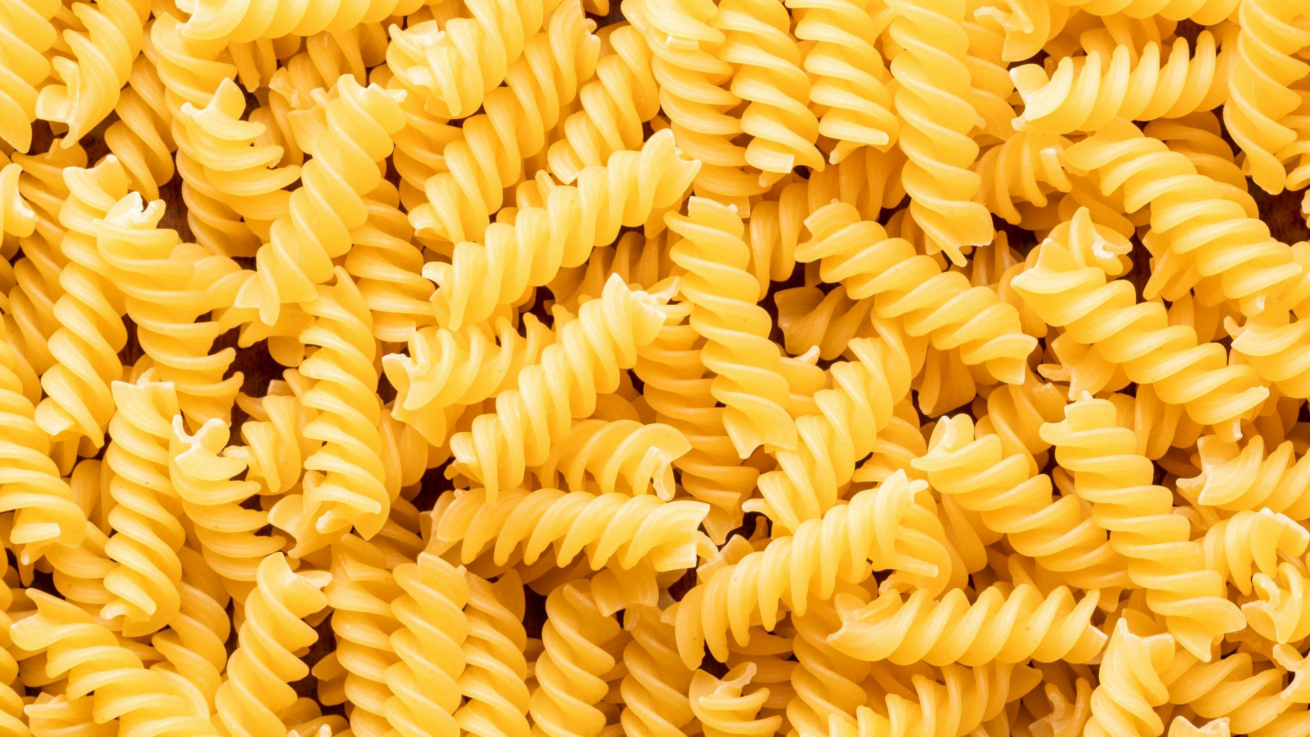 Pile of raw italian fusilli pasta