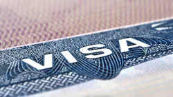 U.S. VISA United States of America. American Tourist or Green Card Visa on passport background. U.S. VISA United States of America. American Tourist or Green Card Visa on passport background.