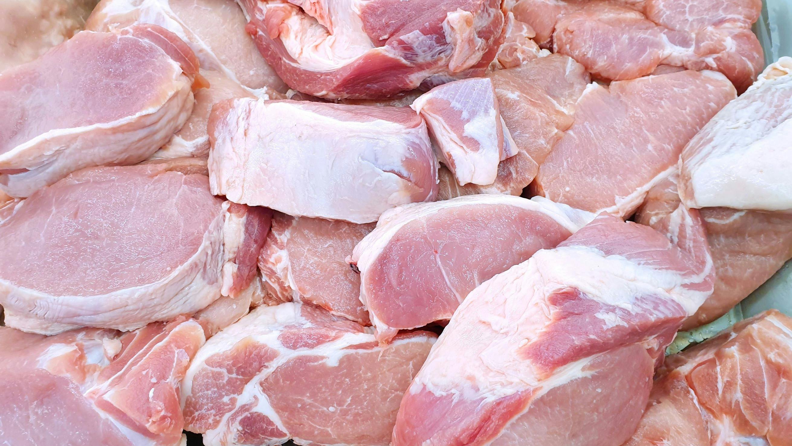 Top view of pork as a background in the market for sale at Thailand, fresh meat for cooking