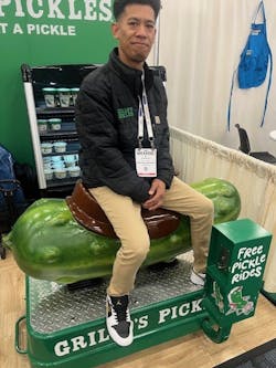 Grillo's Pickles was literally riding the current wave of pickle popularity - and letting booth visitors do likewise. Grillo's Pickles was literally riding the current wave of pickle popularity - and letting booth visitors do likewise.