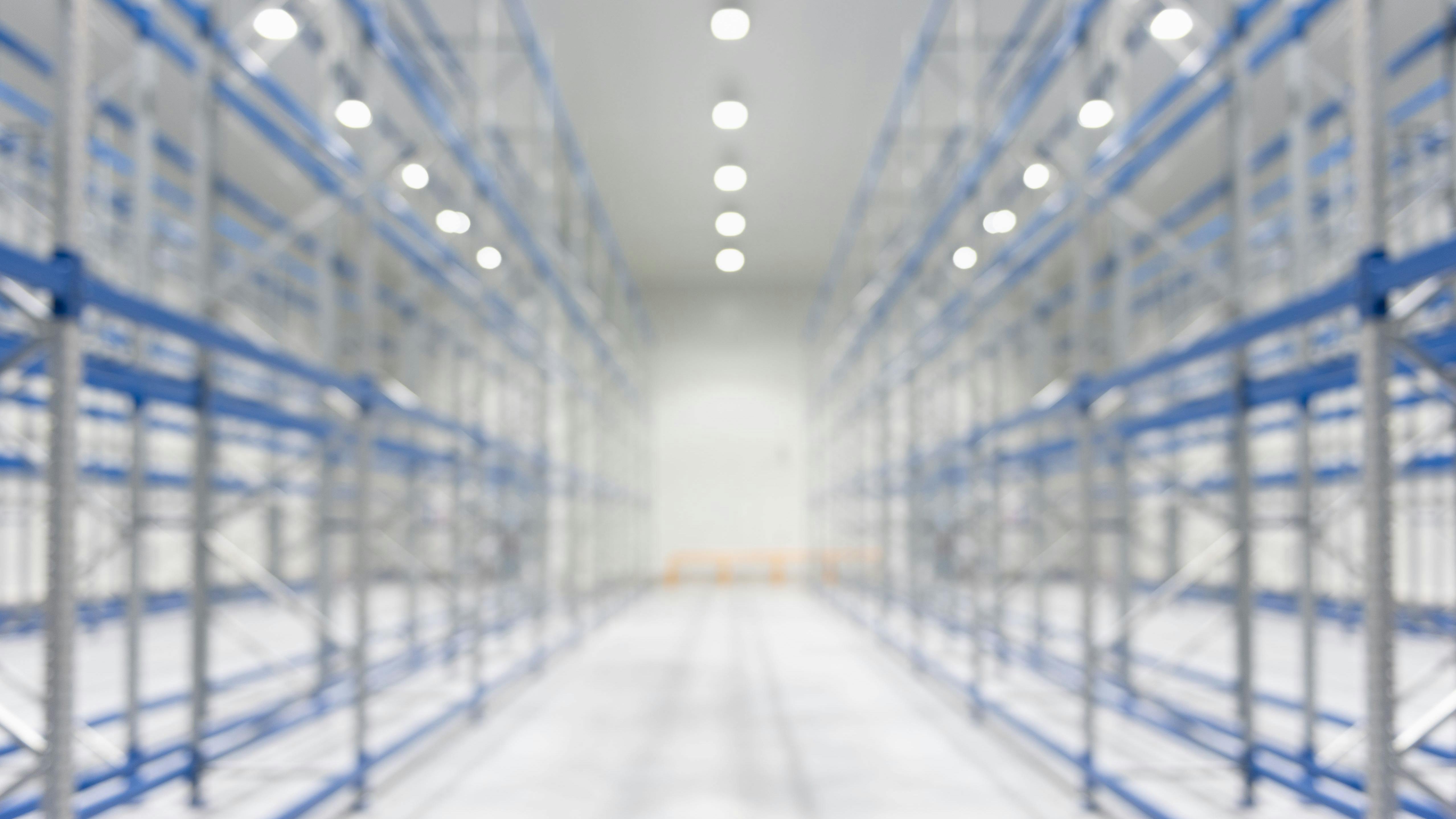 Blur image of New cold room storage for background. Refrigeration and freezing warehouse