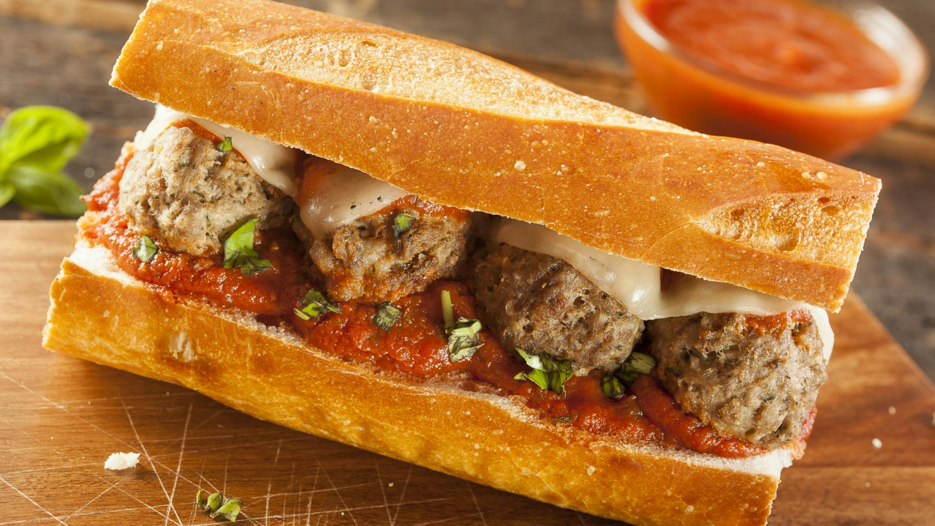 Homemade Spicy Meatball Sub Sandwich with Marinara Sauce and Cheese