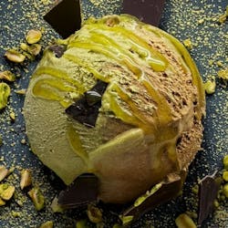 G.S. Gelato's Dubai-Style Chocolate Gelato is chocolate gelato mixed with pistachio gelato, swirled with a pistachio ribbon and finished with Dubai-style chocolate kataifi bark. G.S. Gelato's Dubai-Style Chocolate Gelato is chocolate gelato mixed with pistachio gelato, swirled with a pistachio ribbon and finished with Dubai-style chocolate kataifi bark.