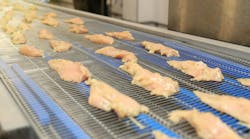 Chicken fillet production line . Factory for the production of food from meat Chicken fillet production line . Factory for the production of food from meat