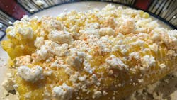 Roasted corn with crema (Mexican cream) and queso fresca (Mexican cheese) Roasted corn with crema (Mexican cream) and queso fresca (Mexican cheese)