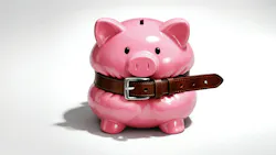 Pink piggy bank squeezed with a belt around the middle Pink piggy bank squeezed with a belt around the middle