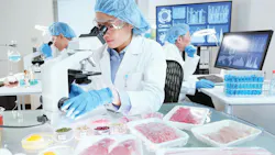 team of scientist researching food in laboratory team of scientist researching food in laboratory