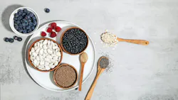 bowls and spoons filled with fiber superfoods