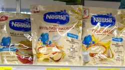 Yekaterinburg, Russia - July 28, 2026: Assorted baby food packages from brands like Nestle and NAN arranged on a supermarket shelf, showcasing different flavors and packaging designs in a retail environment